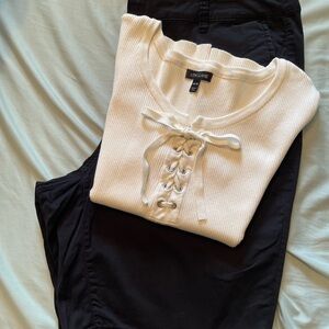 Lane Bryant Cream Lace-Up Tank Top and black Bermuda shorts